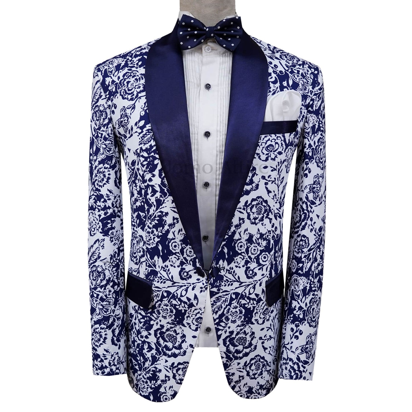 
                  
                    White and Blue Self Print Fabric Classic Tuxedo Suit
                  
                