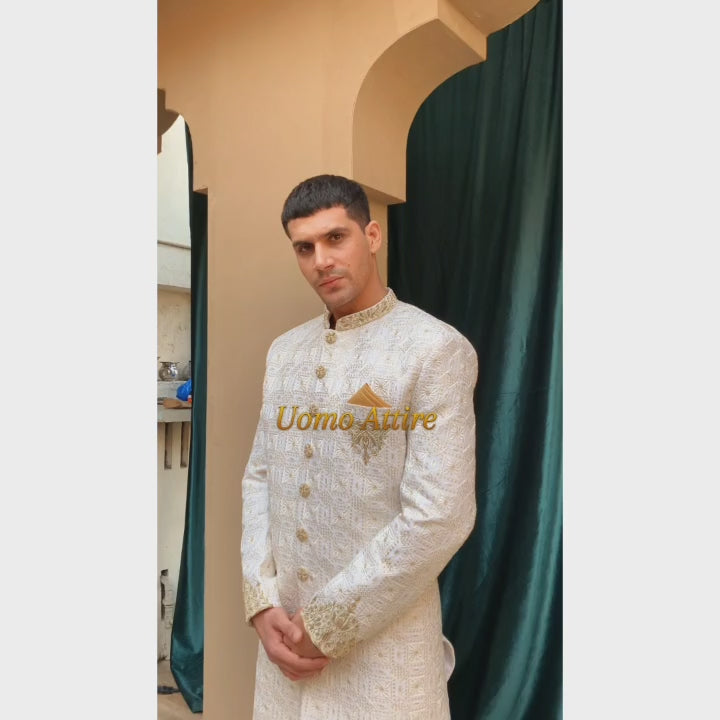 Load and play video in Gallery viewer, Luxurious Off-White Embroidered Sherwani for Groom with Hand-Embellishment