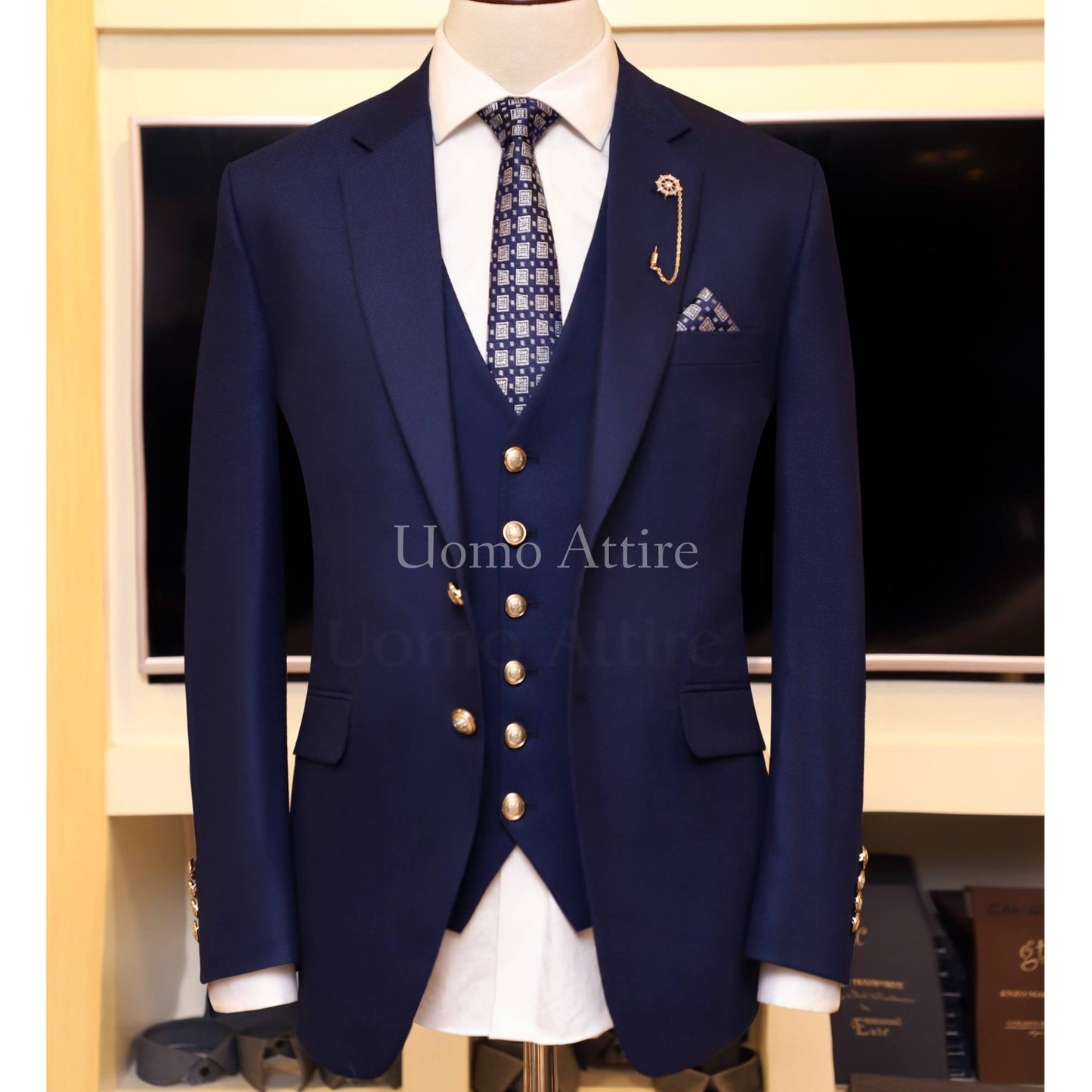 deep ink blue customized three piece suit with single breasted vest