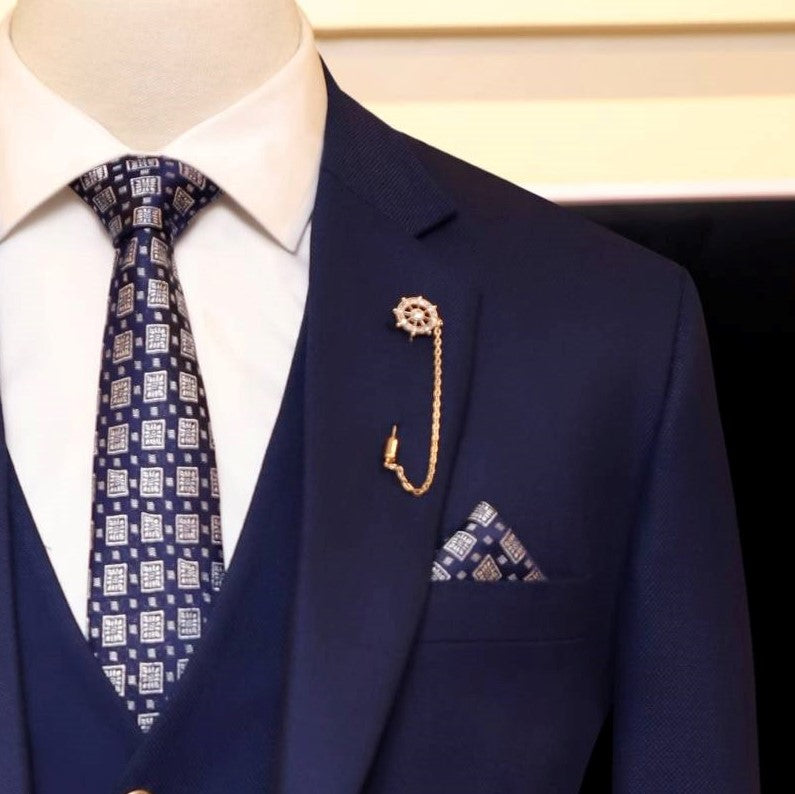 deep ink blue customized three piece suit with single breasted vest and pocket sqaure