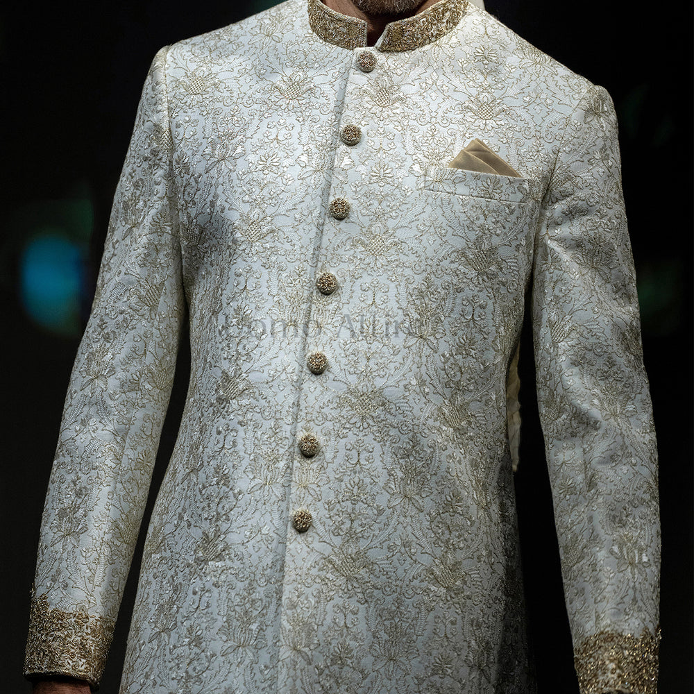 
                  
                    Men's Luxury Ivory & Gold Embroidered Sherwani with Royal Kalgi Turban
                  
                