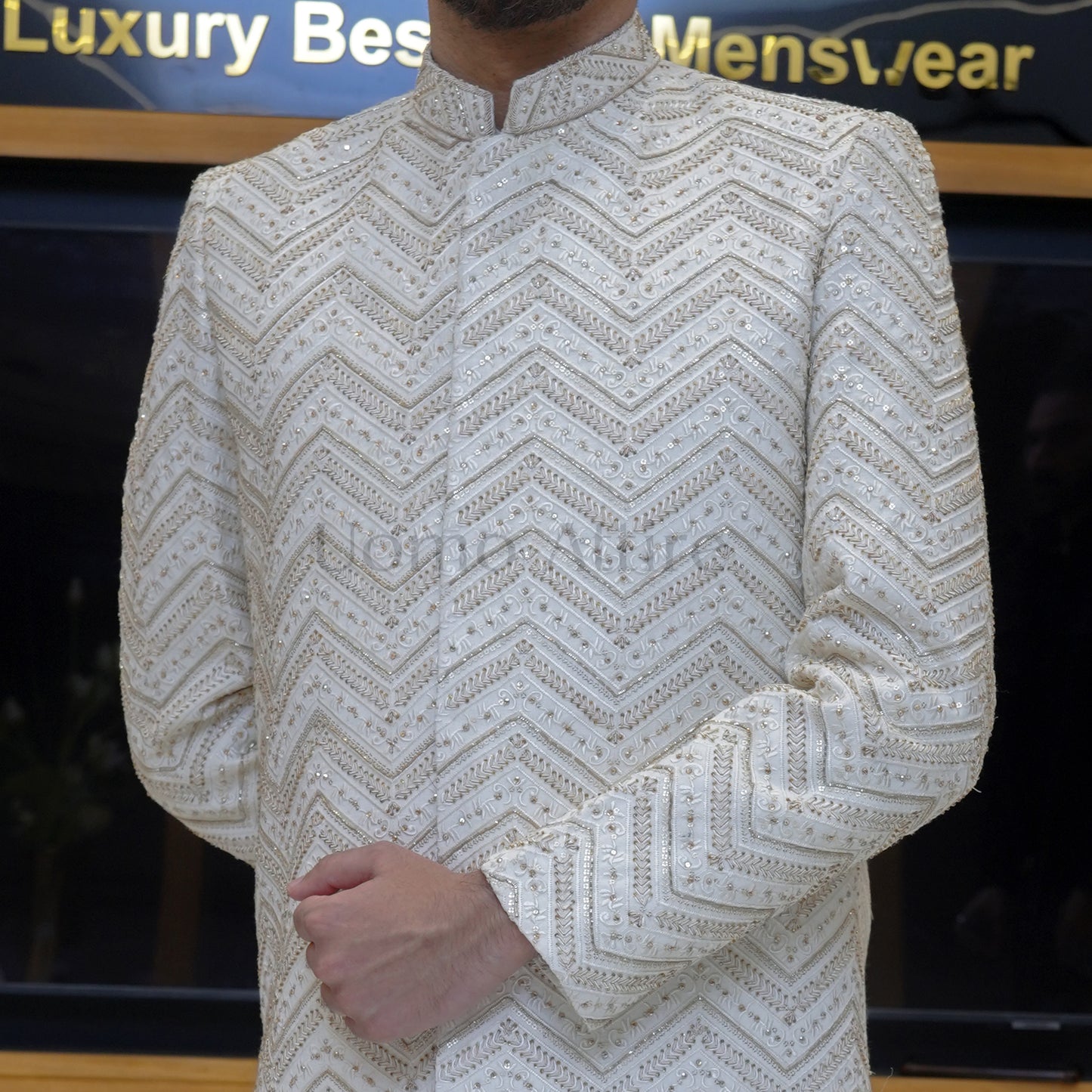 
                  
                    Men's Luxury Off-White Embroidered Sherwani with Maroon Velvet Shawl & Turban
                  
                