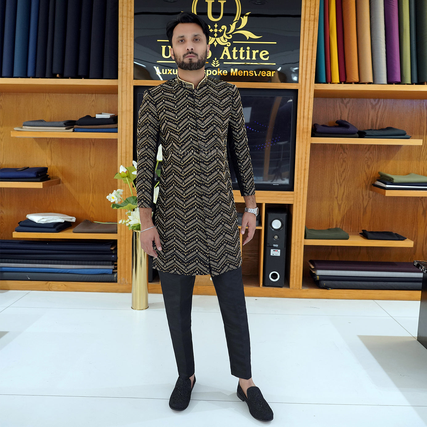 
                  
                    Men's Luxury Black Embroidered Sherwani with Gold Detailing & Saafa
                  
                