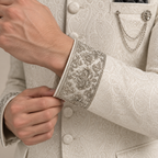 Manteau prince argenté à micro ornements manchette française