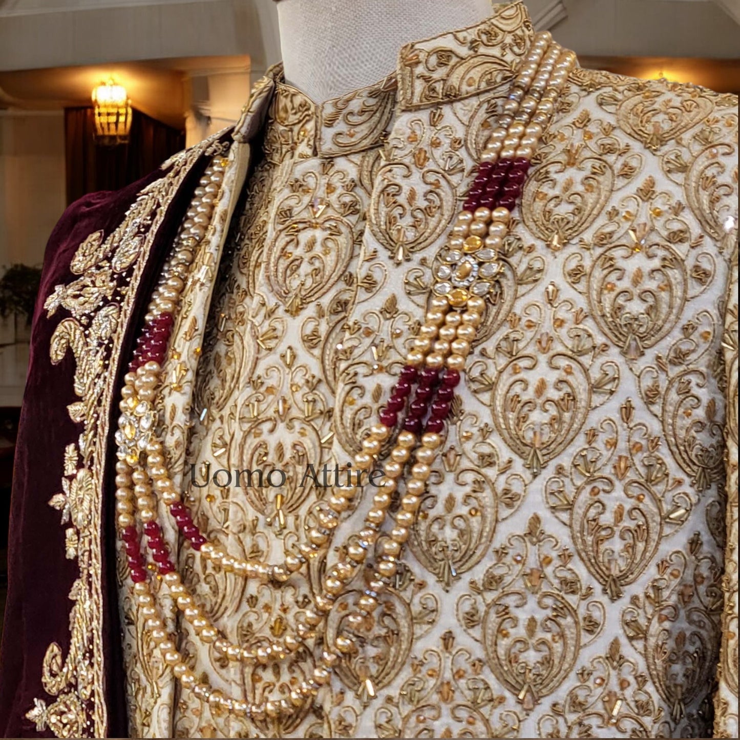 
                  
                    Luxury Open Front Golden Sherwani for Grooms | Embellished Wedding Outfit with Burgundy Shawl
                  
                