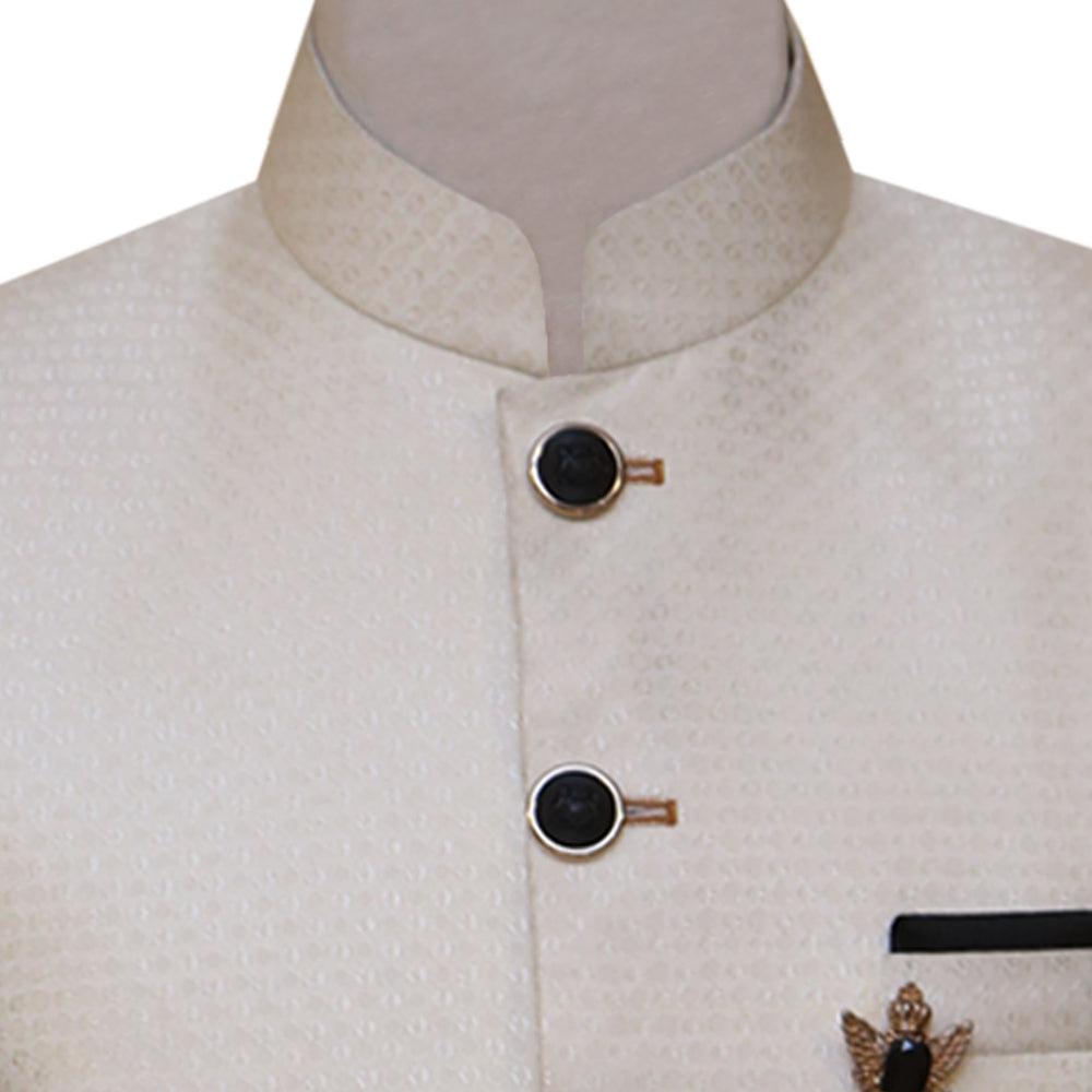 
                  
                    Finch off cream textured jamawar prince coat with contrast buttons throughout
                  
                