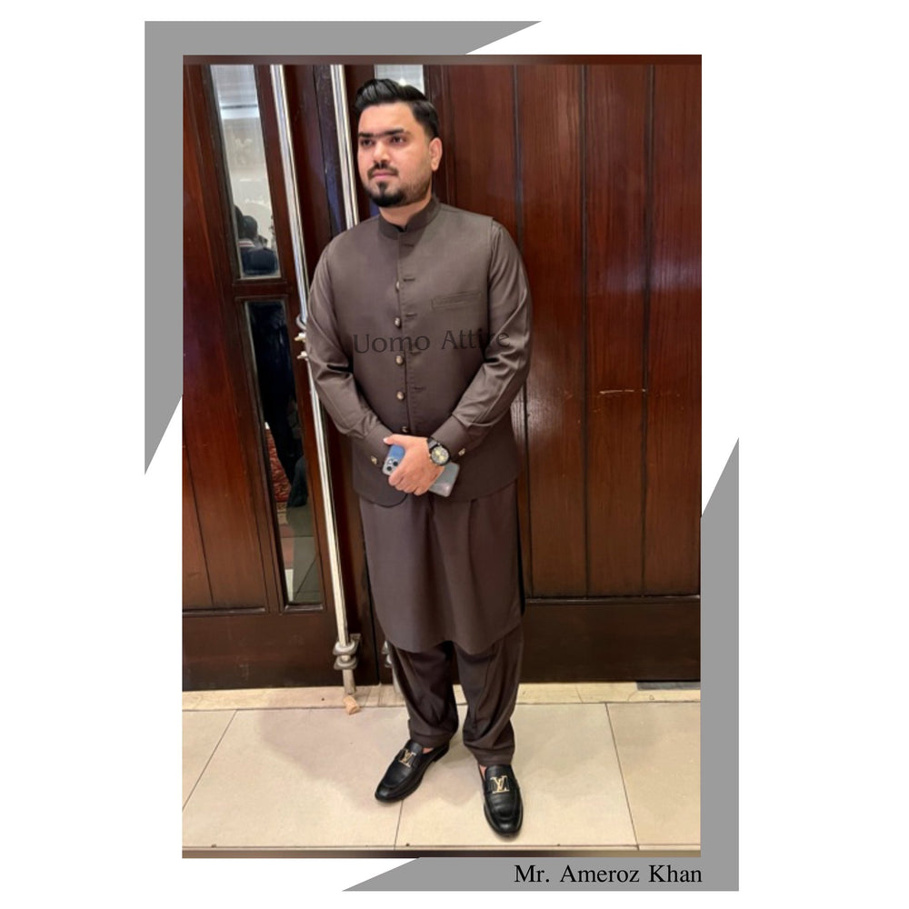 Our client wearing waistcoat with shalwar kameez