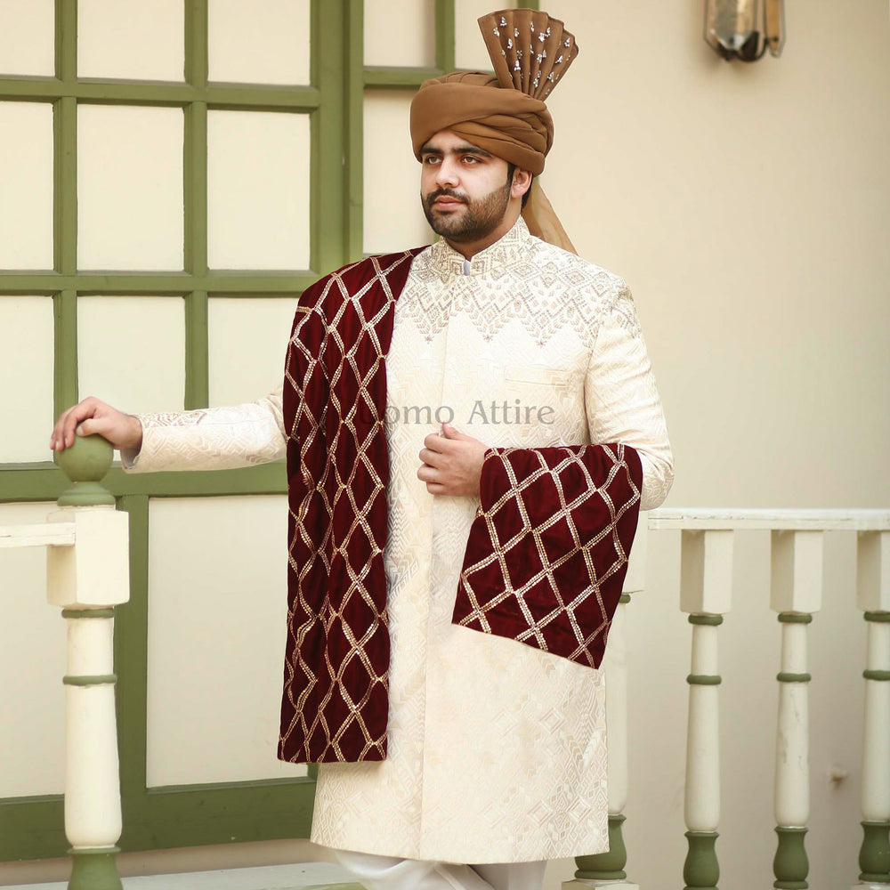 Luxurious Beige Sherwani Set for Groom with Embellished Turban and Maroon Shawl