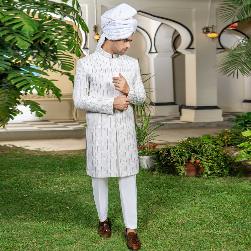 Luxurious White Sherwani for Groom with Silver Embellishments – Elegant Traditional Attire