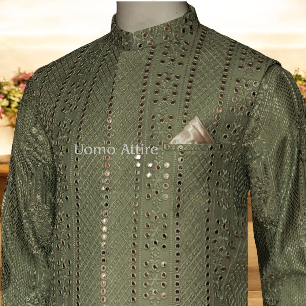 
                  
                    Elegant Olive Green Embroidered Waistcoat with Matching Kurta and Pajama Set
                  
                