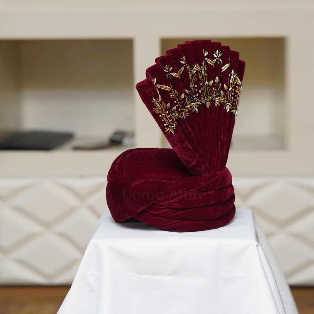 
                  
                    Custom Made Velvet Maroon Turban for Groom with Golden Hand Embellishment
                  
                