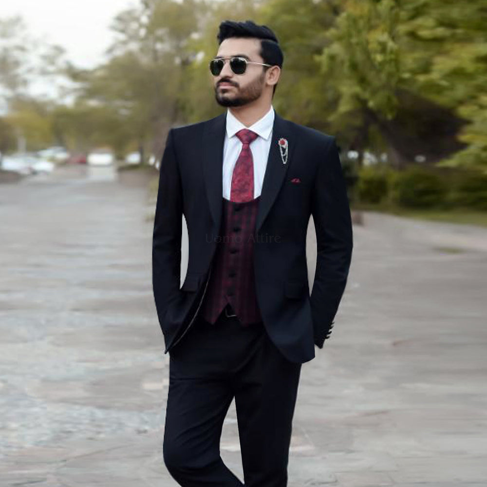 
                  
                    Luxury Black Customized Three-Piece Suit For Men with Contrasting Maroon Checkered Waistcoat
                  
                