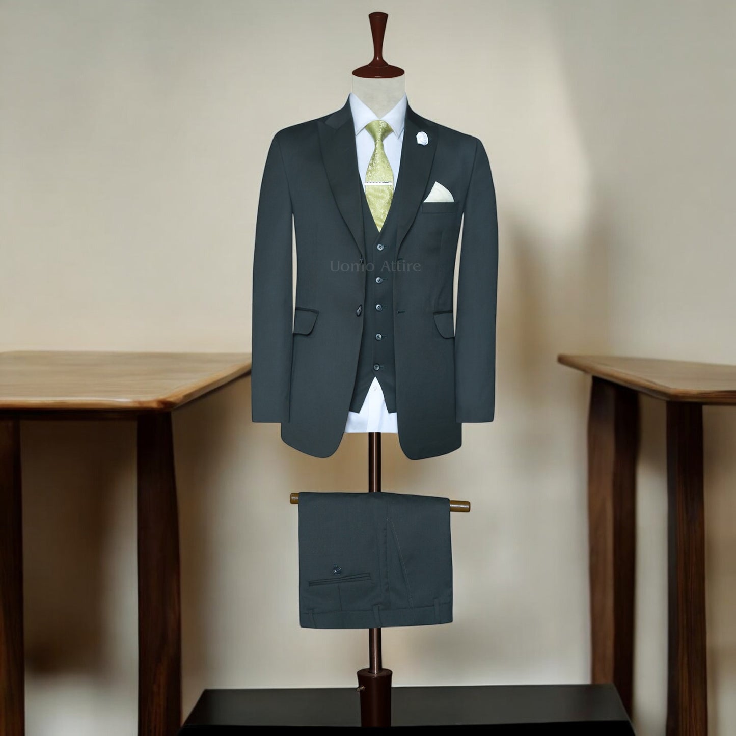 
                  
                    Charcoal Grey Peak Lapel Three-Piece Suit Perfectly Tailored for Grooms
                  
                