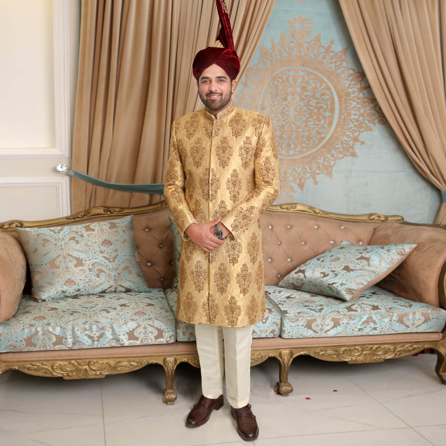 
                  
                    Luxurious Golden Brocade Sherwani with Maroon Velvet Turban
                  
                