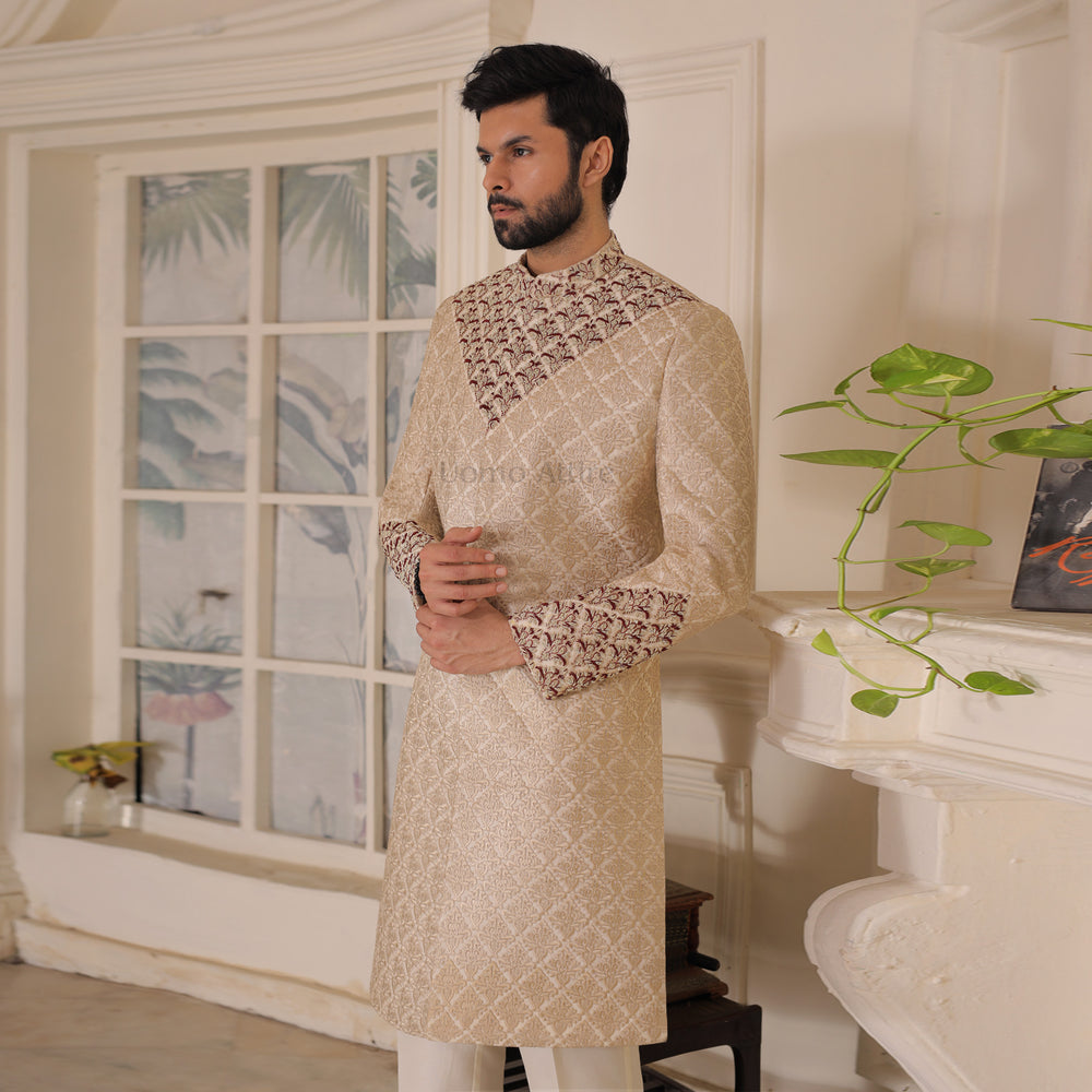 
                  
                    Luxury Beige Embroidered Sherwani with Maroon Embellishments for Grooms
                  
                