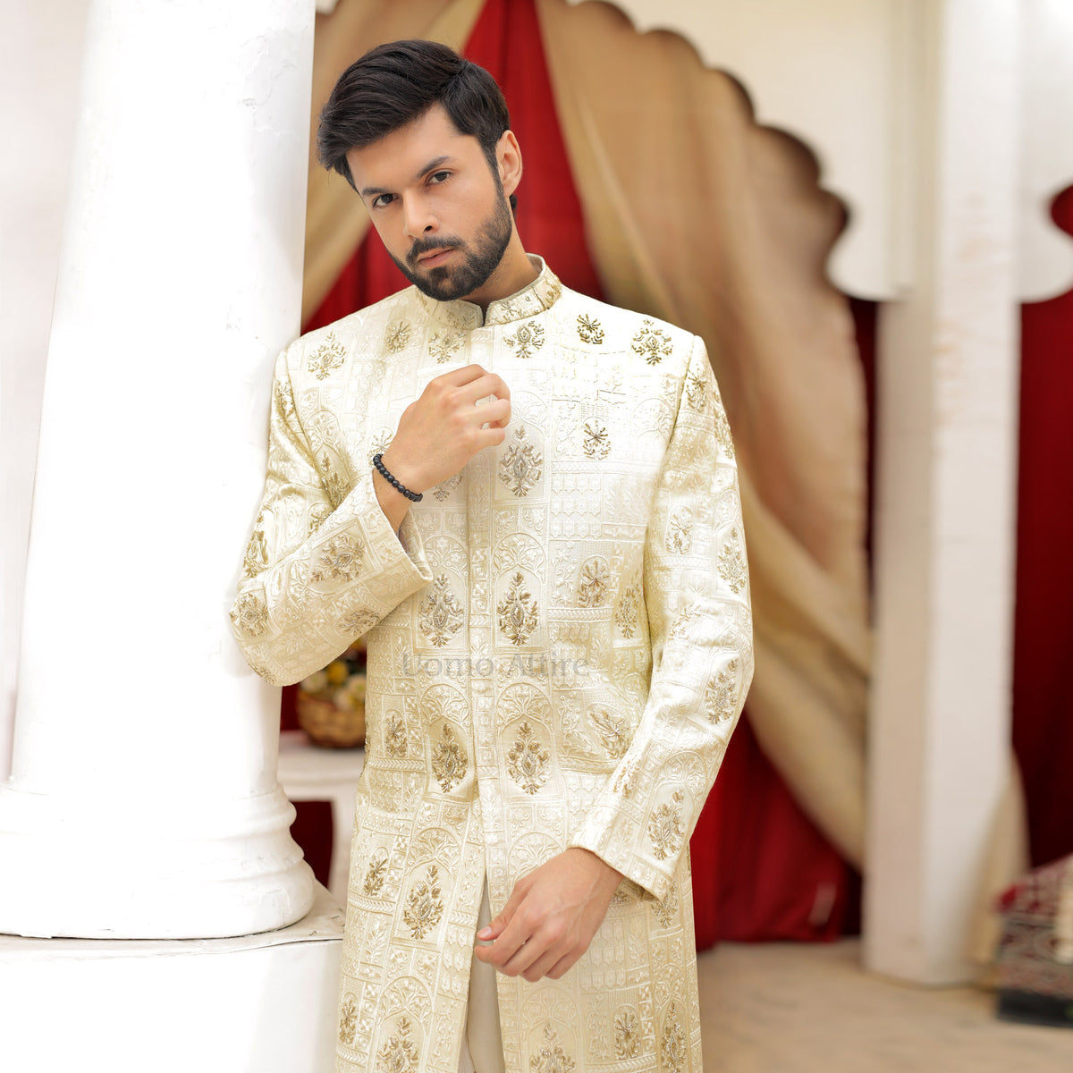 Luxurious Cream and Gold Embroidered Sherwani Ensemble for the Groom