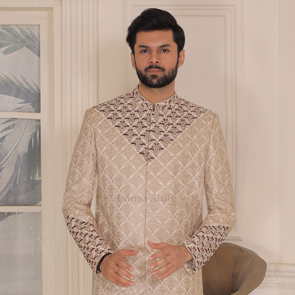 
                  
                    Luxury Beige Embroidered Sherwani with Maroon Embellishments for Grooms
                  
                