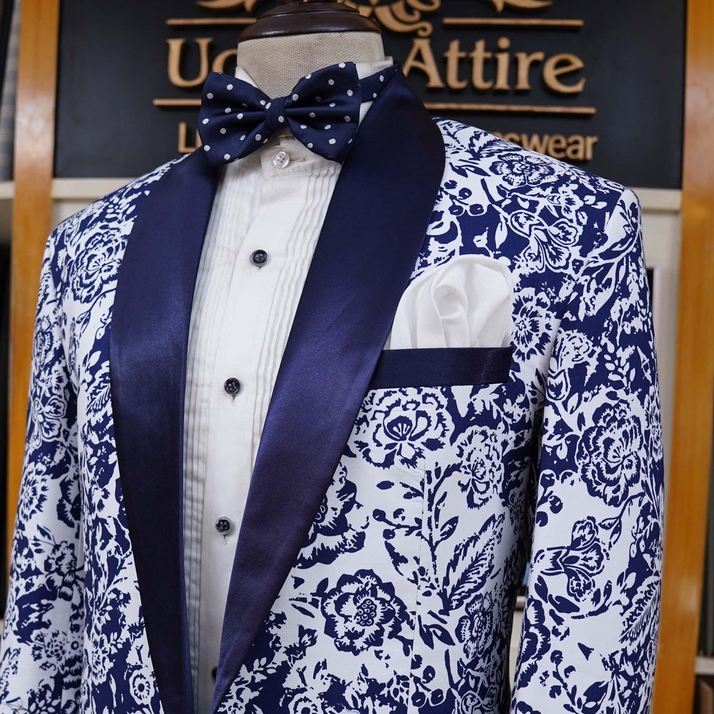 
                  
                    White and Blue Self Print Fabric Classic Tuxedo Suit
                  
                