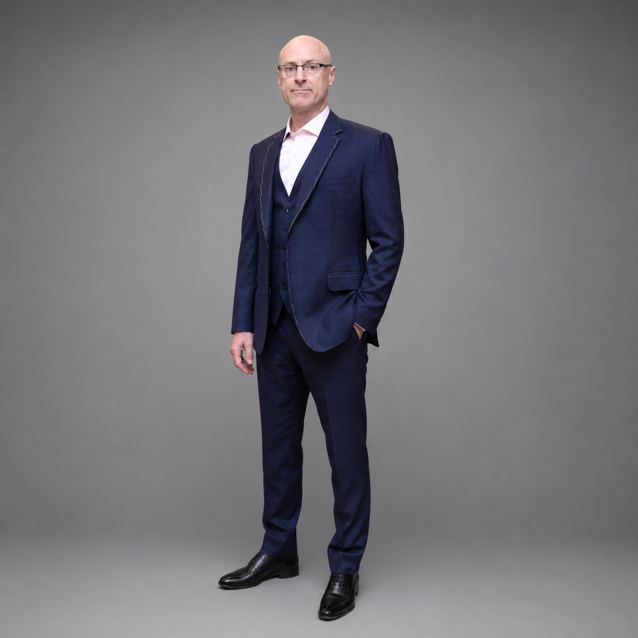 
                  
                    Simon James Mitchell wearing Navy Blue 3 Piece Suit in Cashco Wool
                  
                