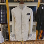 Manteau prince argenté à micro ornements manchette française