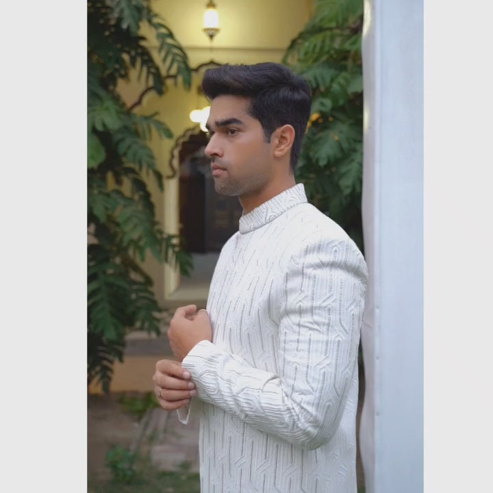 Luxurious White Sherwani for Groom with Silver Embellishments – Elegant Traditional Attire
