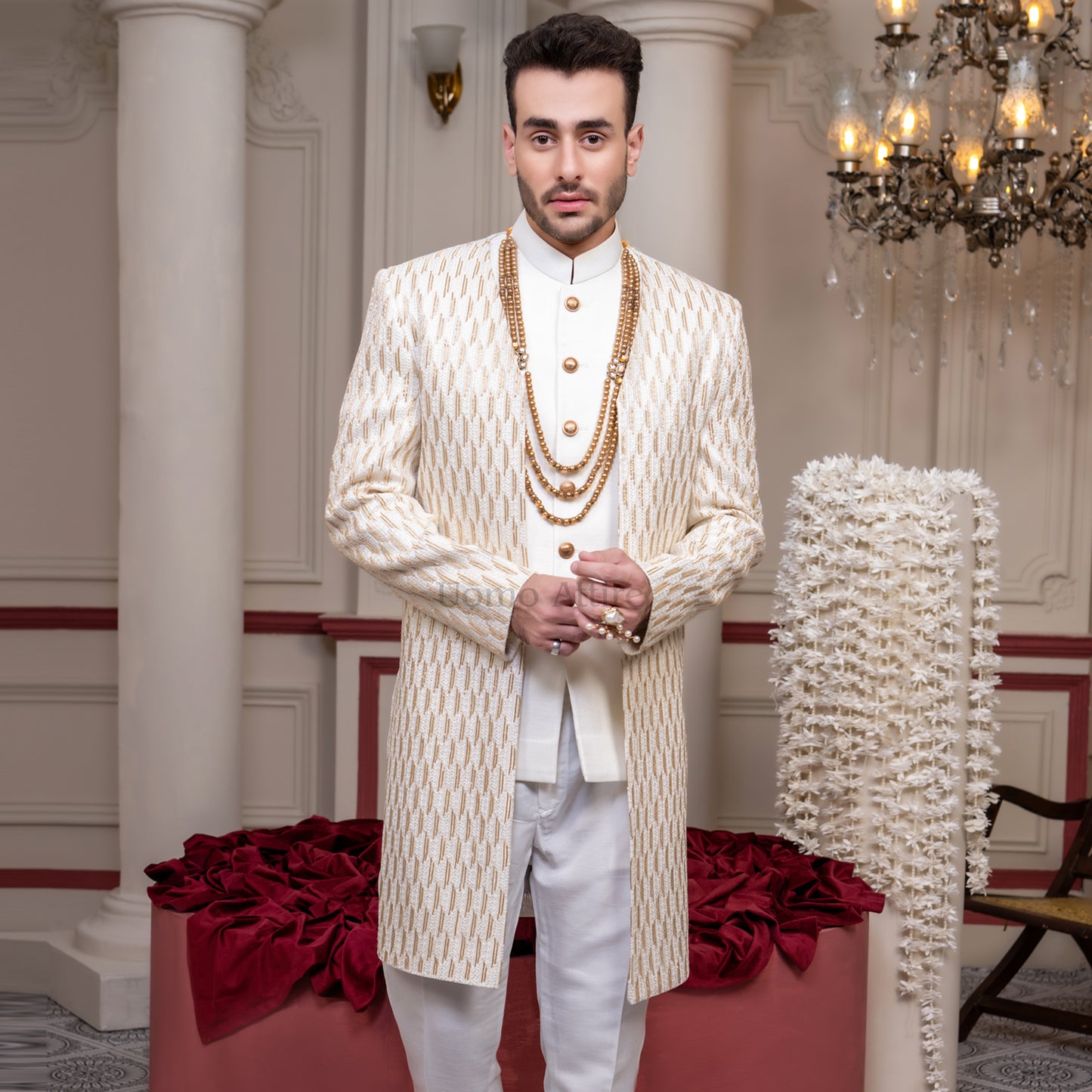 
                  
                    white_sherwani_with_gold_embrodiery
                  
                