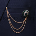 Broche chaîne vert foncé avec petits cailloux blancs cristal 