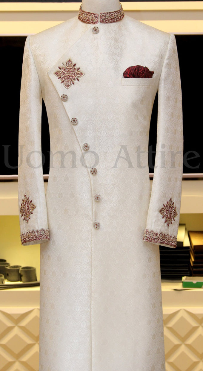 White sherwani adorned with embroidery
