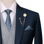 Azzimato deep green customized three piece suit with lapel pin and formal tie