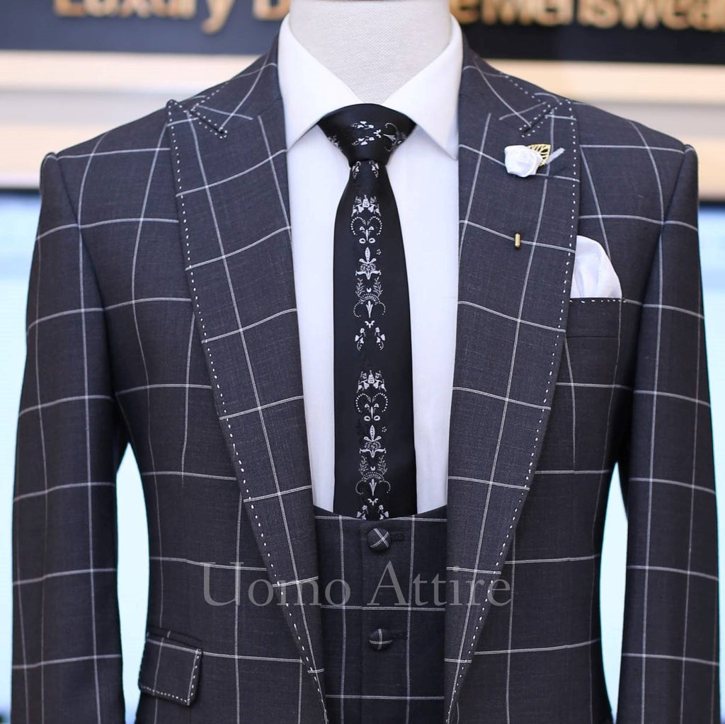 dark grey windowpane check 3 piece suit with single breasted vest and pick stitch