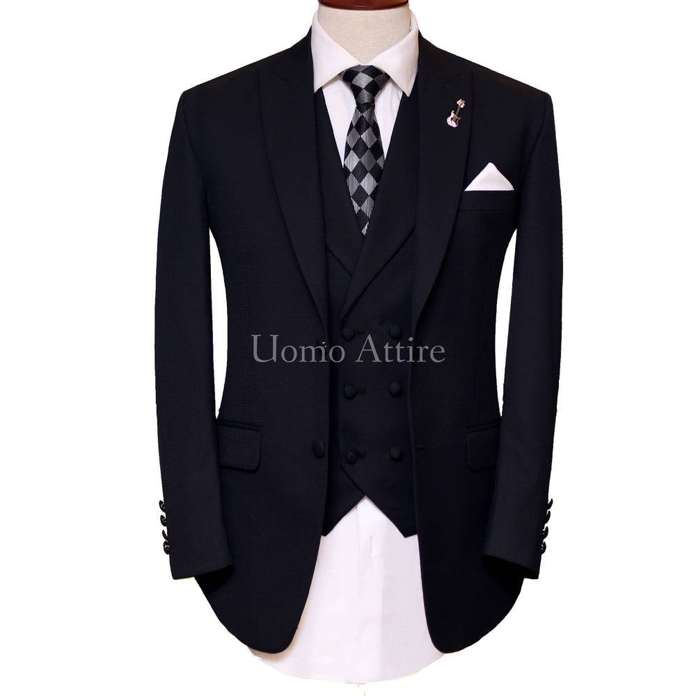 
                  
                    Black self textured three piece suit 100% woolen with same fabric double breasted vest
                  
                
