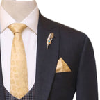 Charcoal gray three piece suit for men with pocket square and lapel pin
