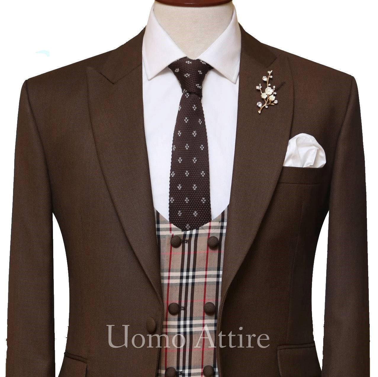 
                  
                    Limited edition self textured contrast three piece suit with double breasted check vest and knitted tie
                  
                
