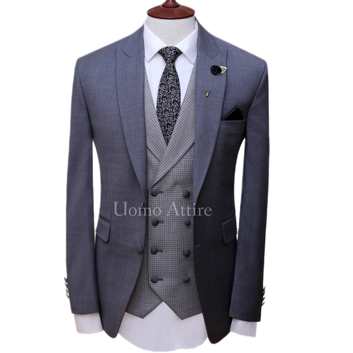 
                  
                    Silver grey three piece suit with v shape shawl lapel
                  
                