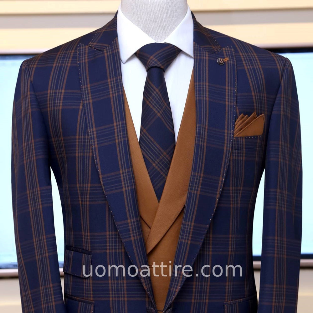 
                  
                    blue and brown check 3 piece suit with same fabric formal tie and pick stitch
                  
                