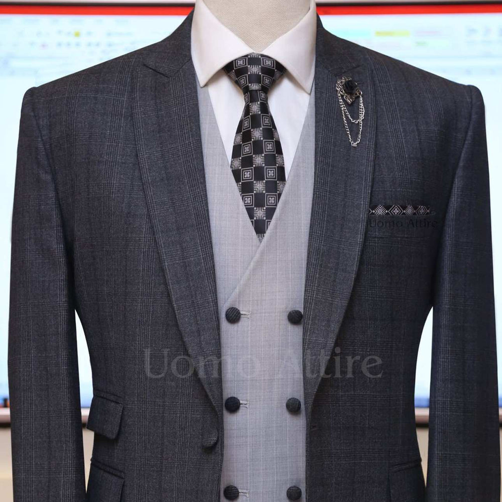 
                  
                    Charcoal grey glen check slim fit three piece suit with double breasted vest
                  
                