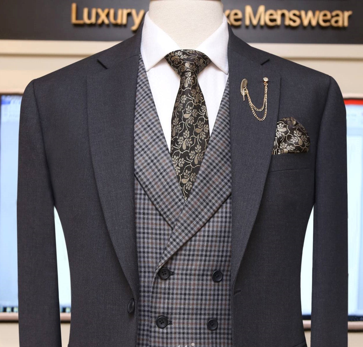 
                  
                    lightweight four season gray 3 piece suit with double breasted mini check vest and chain brooch
                  
                