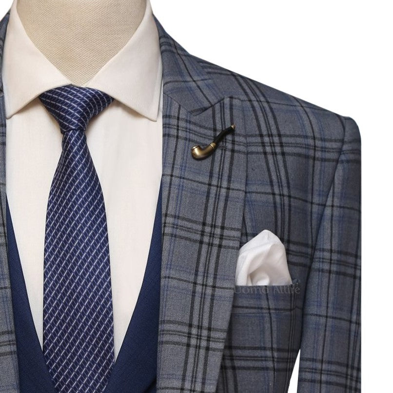 window pane check 3 piece suit with lapel pin and pocket sqaure